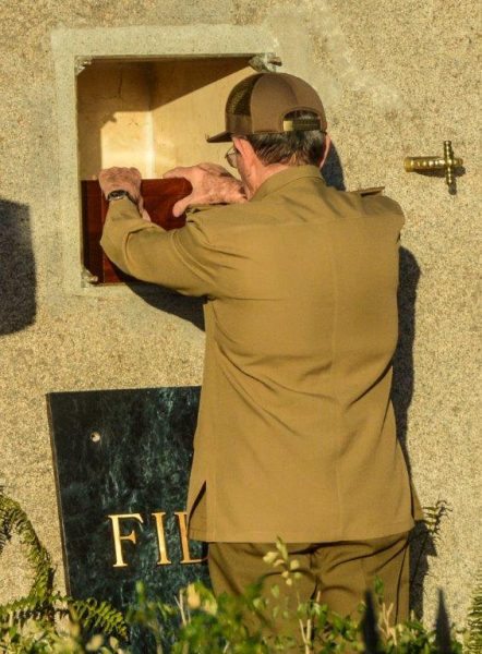 Cuba's President Raul Castro places the box containing the ashes of Cuba's former President Fidel Castro into a boulder at the Santa Ifigenia Cemetery, in Santiago de Cuba, December 4, 2016. REUTERS/ACN/Marcelino Vazquez/via REUTERS THIS IMAGE HAS BEEN SUPPLIED BY A THIRD PARTY. IT IS DISTRIBUTED, EXACTLY AS RECEIVED BY REUTERS, AS A SERVICE TO CLIENTS FOR EDITORIAL USE ONLY. NOT FOR SALE FOR MARKETING OR ADVERTISING CAMPAIGNS