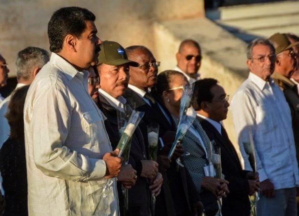 Venezuela's President Nicolas Maduro (L) and his Nicaraguan counterpart Daniel Ortega (3rd L) attend a private ceremony where the ashes of Cuba's former President Fidel Castro were laid to rest at the Santa Ifigenia Cemetery, in Santiago de Cuba, December 4, 2016. REUTERS/ACN/Marcelino Vazquez/via REUTERS THIS IMAGE HAS BEEN SUPPLIED BY A THIRD PARTY. IT IS DISTRIBUTED, EXACTLY AS RECEIVED BY REUTERS, AS A SERVICE TO CLIENTS FOR EDITORIAL USE ONLY. NOT FOR SALE FOR MARKETING OR ADVERTISING CAMPAIGNS