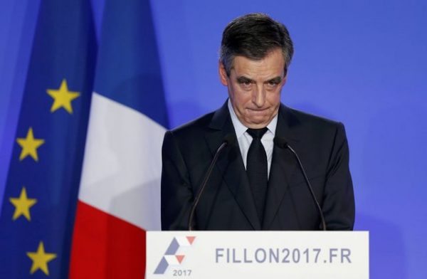 Francois Fillon, former French prime minister, member of The Republicans political party and 2017 presidential candidate of the French centre-right, reacts during a news conference about a "fake job" scandal at his campaign headquarters in Paris, France, February 6, 2017. REUTERS/Benoit Tessier